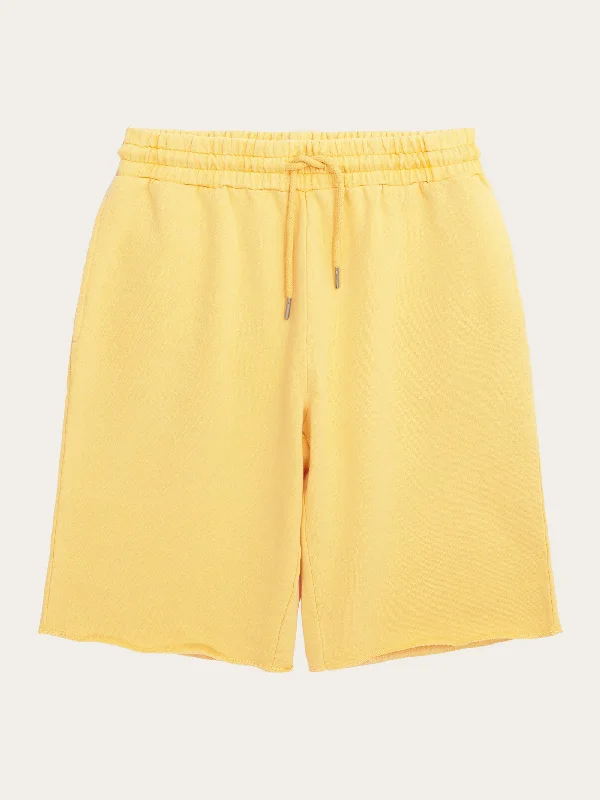 Custom Shorts With Custom Sleeve Text-BIRCH sweat shorts - GOTS/Vegan - Misted Yellow